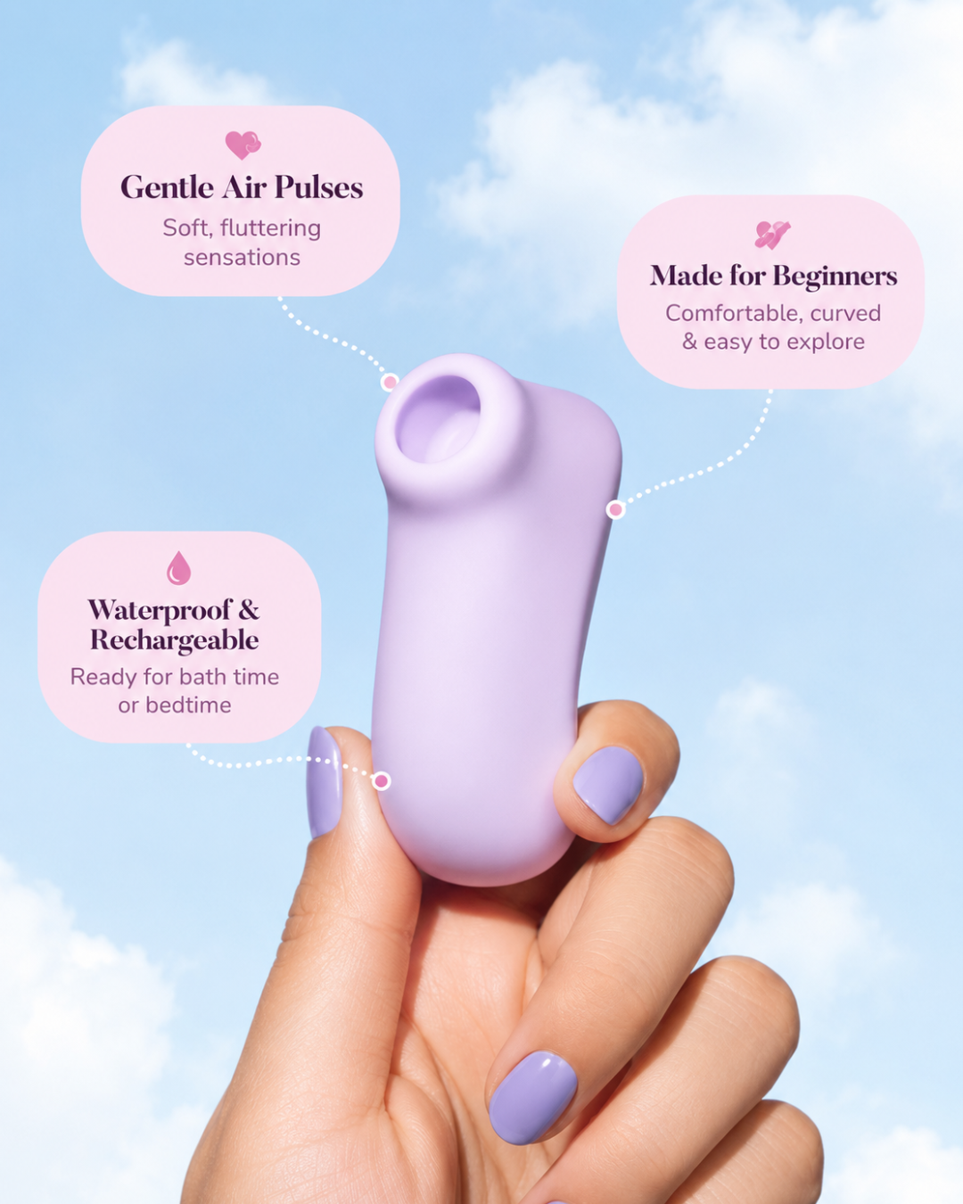 Hand holding the Esmerelda Roco Loco purple clitoral suction vibrator with feature callouts showing gentle air pulses, beginner-friendly design, and waterproof USB rechargeable functionality.