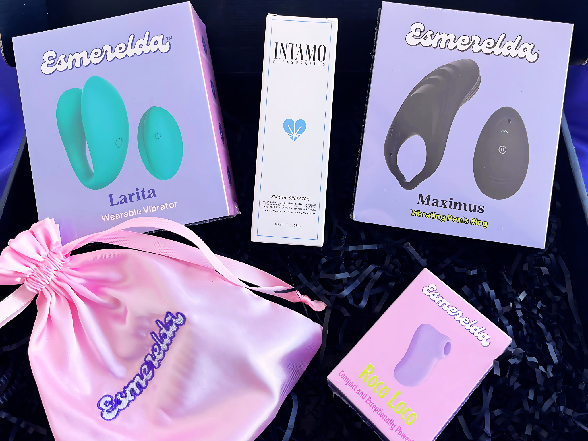Esmerelda's Valentine’s Day Bundle: A curated collection of intimate essentials, featuring the Larita Wearable Vibrator, Maximus Vibrating Penis Ring, Smooth Operator lubricant, Roco Loco clitoral stimulator, and a luxurious satin gift bag. Perfectly packaged for love, laughter, and pleasure this Valentine’s Day.